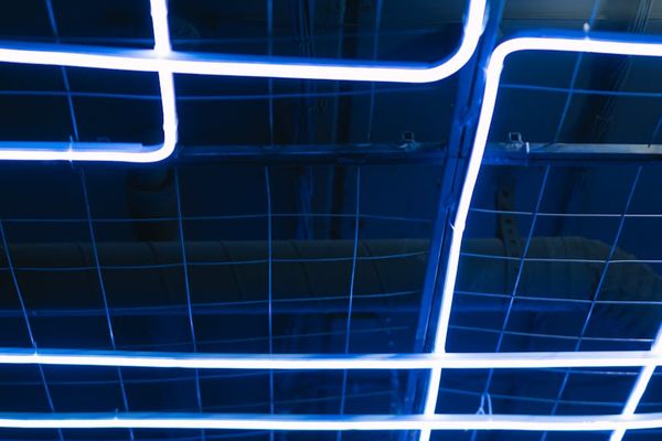 Graphic representation of a logical training flow with neon lines