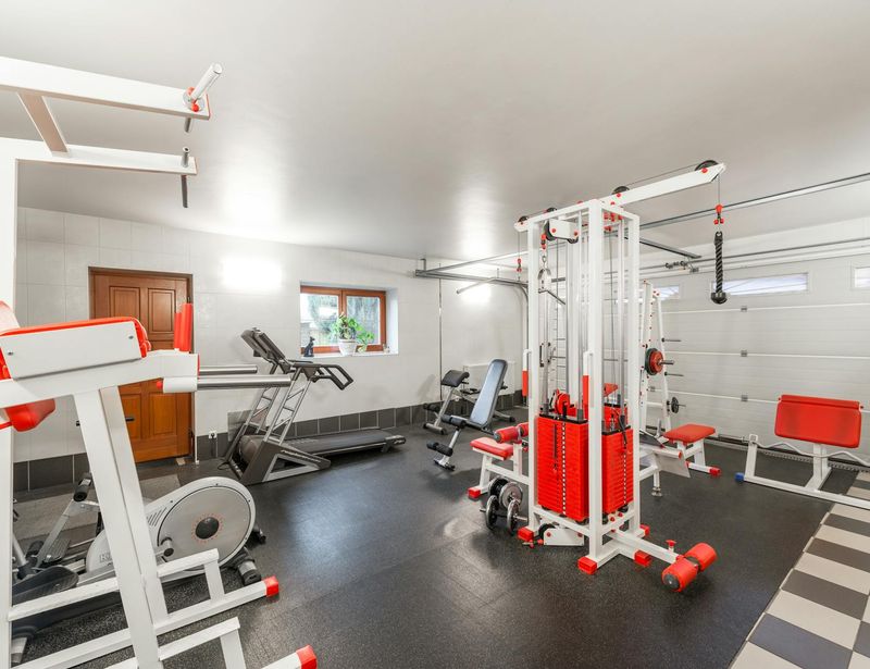 Modern minimalist training space with neon accents and gym equipment